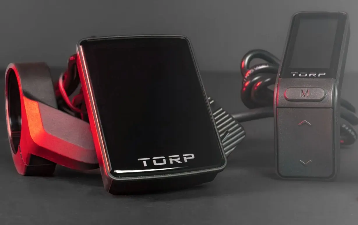 Two TORP displays, the larger Full Color Display and the compact Black & White Display, with handlebar mount